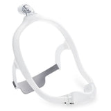 Angled view of the Philips DreamWear nasal mask frame with its top of head elbow and gray strap
