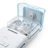 Philips DreamStation water chamber seated in the humidifier of a DreamStation machine with the lid open