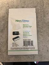 ResMed ClimateLineAir heated tube coiled on white beside the AirSense 10 compatible filter three-pack included in this bundle