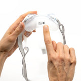 Two hands clicking a new AirFit F30i cushion onto the mask frame