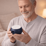 A man holds the Transcend Micro 510 in Midnight Blue in both hands, showing its front air outlet