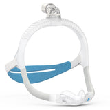 The AirFit N30i showing its nasal cradle cushion, SpringFit frame and adjustable blue headgear straps