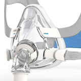 Close-up front view of AirFit F20 full face mask displaying InfinitySeal cushion, QuietAir vent, and clear frame design