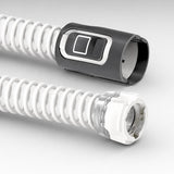 Close-up of the ResMed AirMini tube's machine-end connector and the clear mask-end coupling