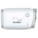 ResMed AirMini seen side on against white, power button and Bluetooth button on the front face