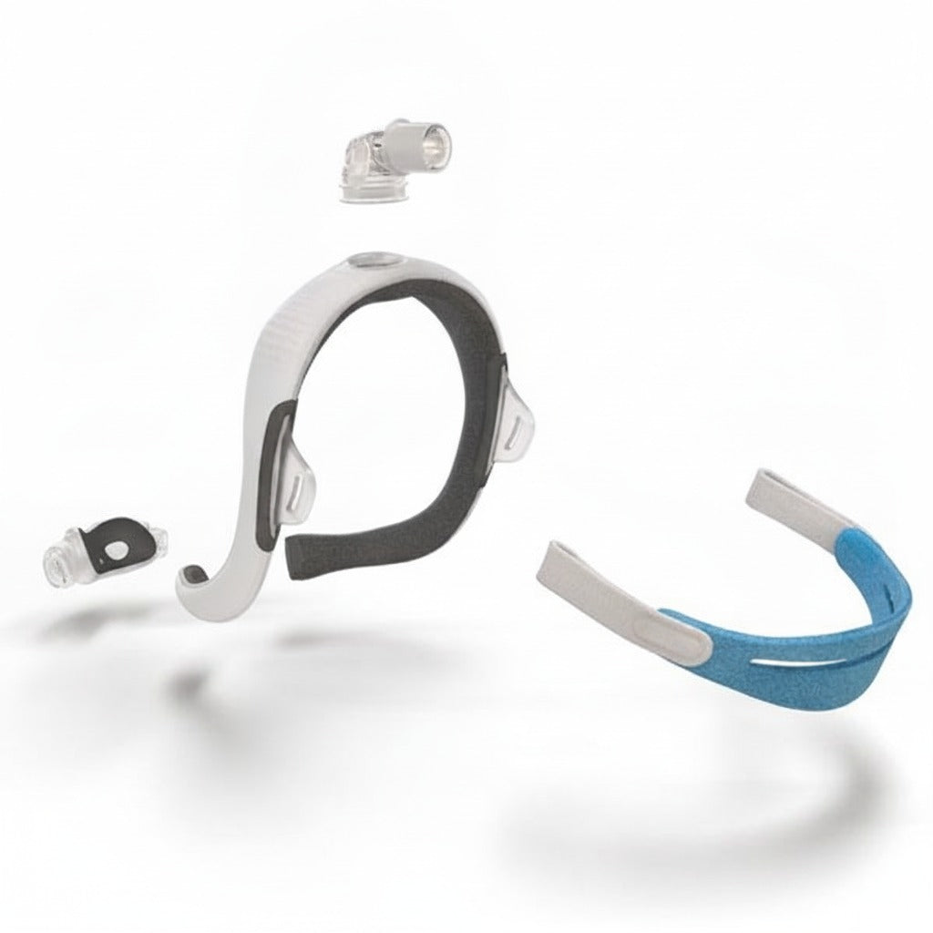 The ResMed AirTouch N30i separated into its four parts, viewed from behind: nasal cushion, fabric wrapped frame, elbow and headgear