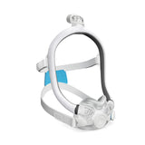 Angled view of the AirTouch F30i Comfort showing the fabric-covered frame, lower headgear clips and ComfiSoft cushion