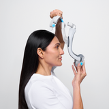 Photograph of a woman lifting the AirTouch F30i Comfort frame over her head before setting the cushion in place
