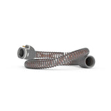 ResMed ClimateLineAir 11 heated tube coiled on white, flat gold-pin connector visible at the machine end