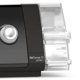 ResMed HumidAir reusable water tub seated in the side of an AirSense 10 AutoSet machine