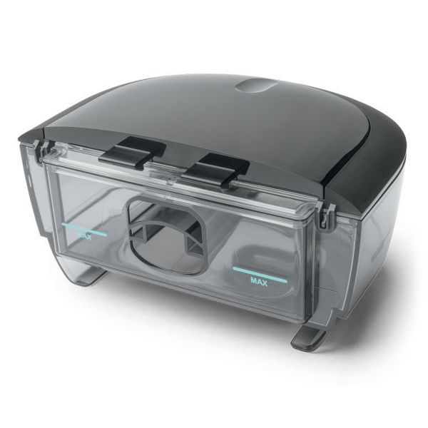 The complete DreamStation 2 water tank and lid, shown from a three-quarter angle with the MAX fill lines visible