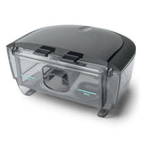 The complete DreamStation 2 water tank and lid, shown from a three-quarter angle with the MAX fill lines visible