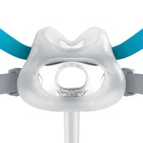 The Evora Full Face seal mounted on the mask with the turquoise headgear straps attached, front view