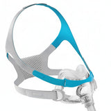 The Evora Full Face mask at an angle, showing the stability wings and the VentiCool knitted headgear