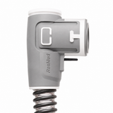 Close-up side view of the ResMed ClimateLineAir machine cuff elbow, showing the ResMed logo and C and T port markings
