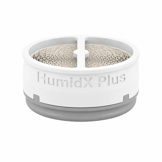 Single ResMed HumidX Plus cartridge level on white, gray base ring and the mesh exchange core visible