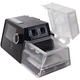 The Luna G3 with its water chamber slid out and lidded open, showing the twin-port transfer box