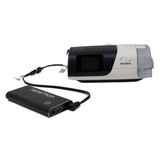 The Medistrom Pilot Flex powering a ResMed AirSense 11 through its DC output cable on a white background