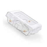 Philips DreamStation water chamber, three quarter product view of the closed tank on white