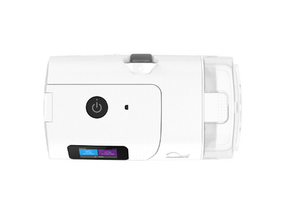 Top-down view of the ResMed AirCurve 11 VAuto with the water chamber seated in the side of the housing