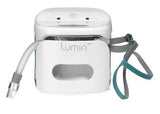 Photograph of the Lumin device with the drawer cracked open and a mask hose resting inside