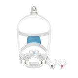 Front view of the AirFit X30i beside the small and large nasal pillows that come in the box